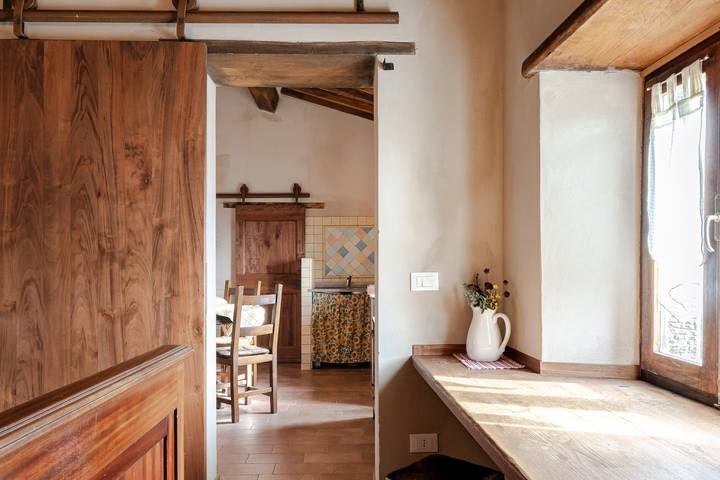 Appartamento intero, Appartamento 'Reggioli- Falegname' con vista sulle montagne, giardino in comune e balcone in Gaiole in Chianti, Chianti