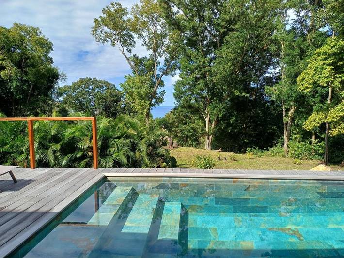 Villa pour 4 personnes, avec jardin ainsi que piscine et vue à Deshaies