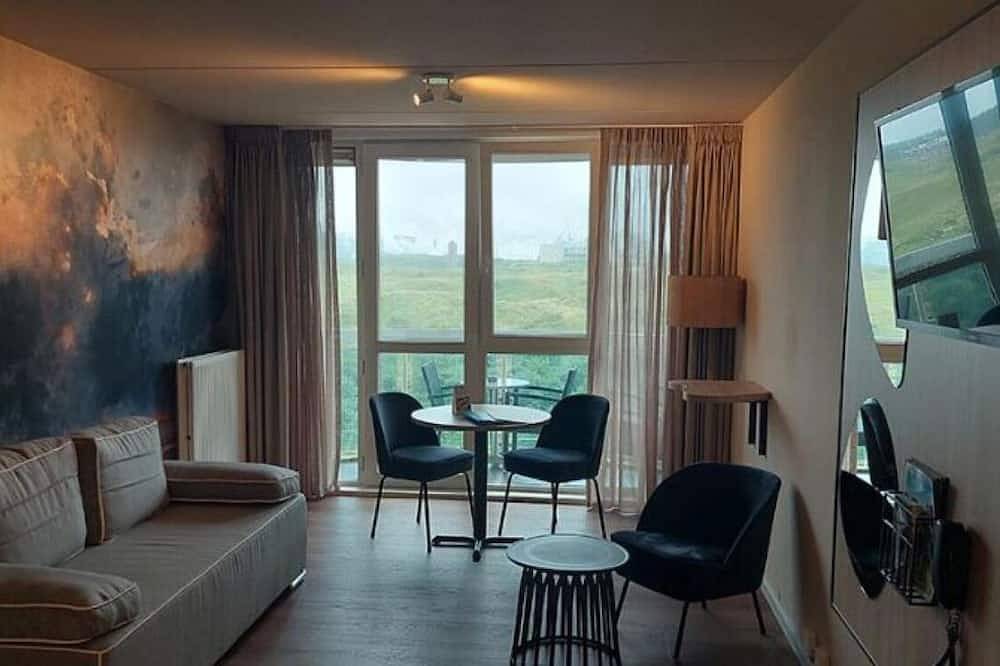 Explore Holland’s Coastline from This Charming Room with Balcony in Wijk aan Zee, Nederlandse Noordzeekust