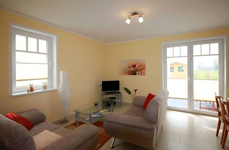 Ferienwohnung für 4 Personen, mit Terrasse und Garten sowie Sauna in Börgerende-Rethwisch