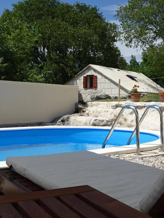 Ferienhaus für 4 Personen, mit Terrasse und Pool