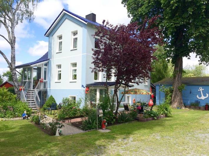 Ferienwohnung für 4 Personen, mit Terrasse und Garten sowie Ausblick