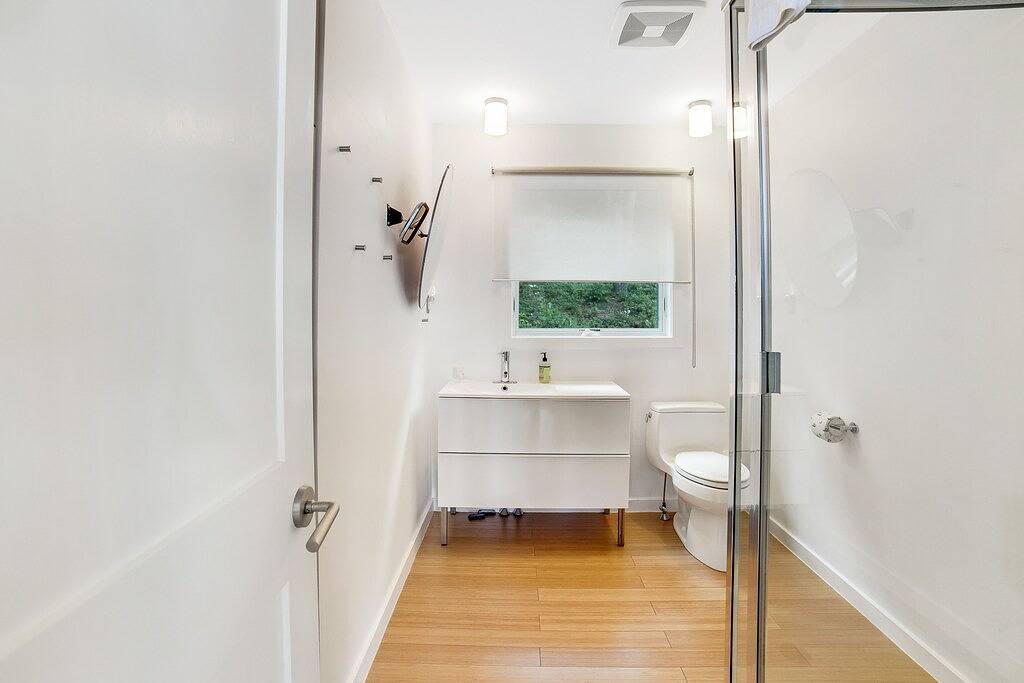 Lakefront contemporary gem with decks, lake views & pebble beach in Seneca Lake