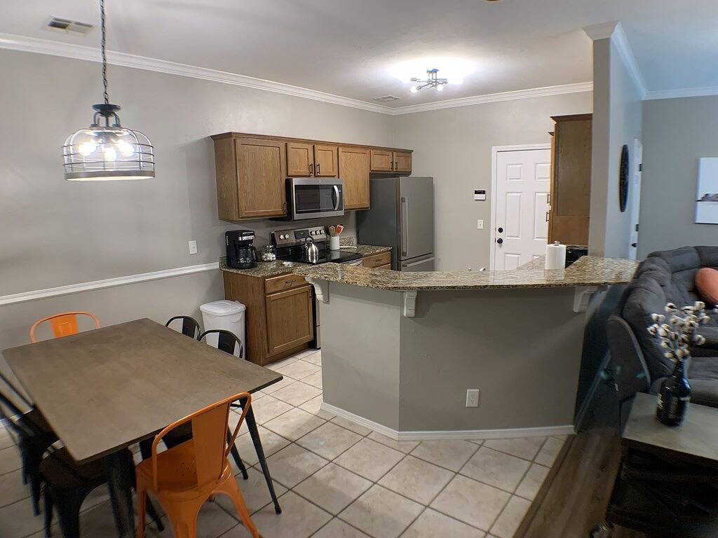 Wooded Area near Uco & Hospitals with Neighborhood Pool. in Edmond, Oklahoma County