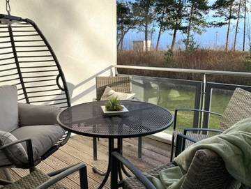 Ferienwohnung für 3 Personen, mit Seeblick und Balkon in Juliusruh