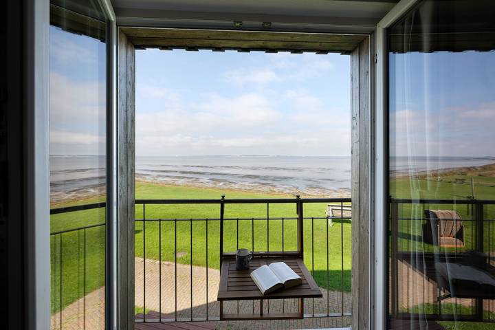 Ganze Wohnung, Ferienwohnung 'Watt'nblick' mit Meerblick, Strandkorb und Wifi in Langeneß, Halligen