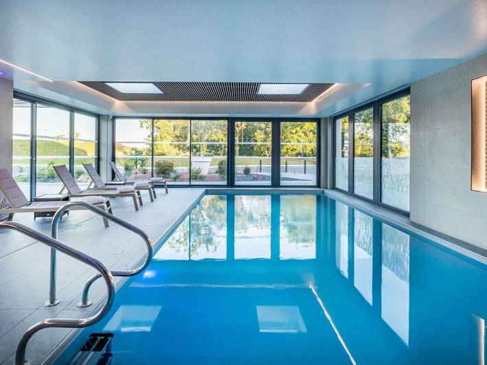 Hôtel pour 3 personnes, avec Terrasse et Jardin ainsi que Piscine et Sauna