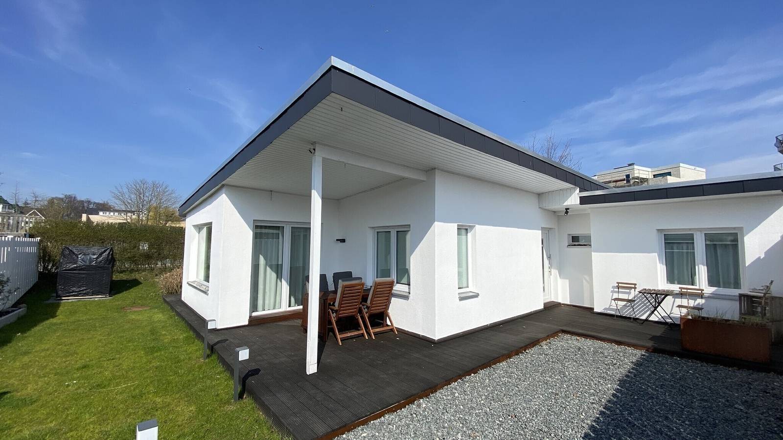 Ferienwohnung 'Ferienhaus Lütt Hus An D'see' mit eigener Terrasse, eigenem Garten und Wi-Fi in Scharbeutz, Ostholstein