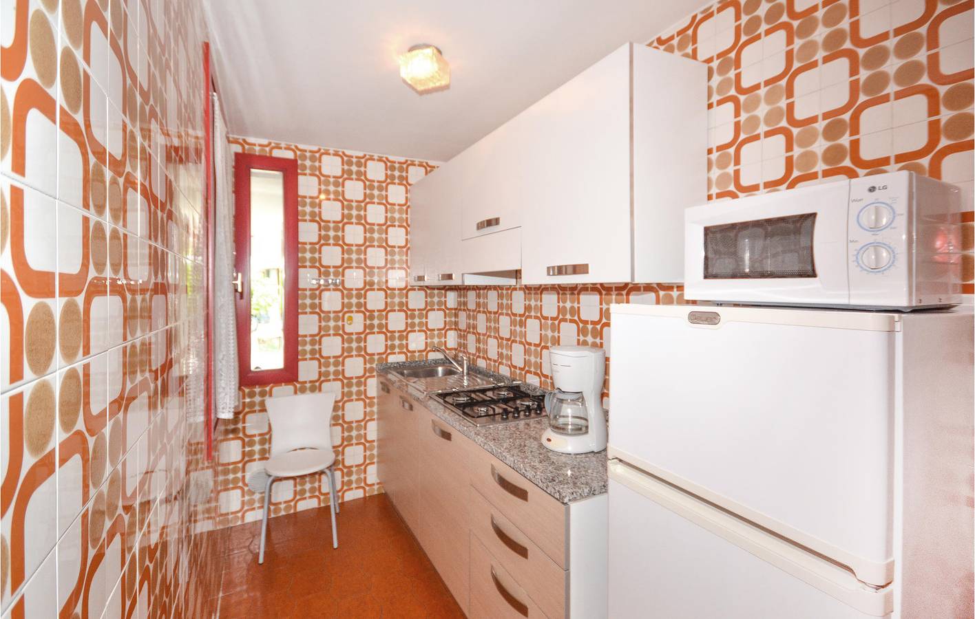 Wochenende am Wasser: 65qm mit AC, Parkplatz, Pool und Küche! in Lignano Sabbiadoro, Udine Provinz