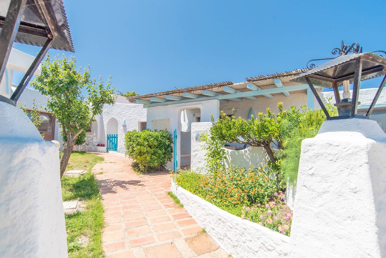 Cottage Penelope: un incantevole villetta mediterranea vicino alla spiaggia con giardino e terrazza in Palau (Sardegna), Gallura
