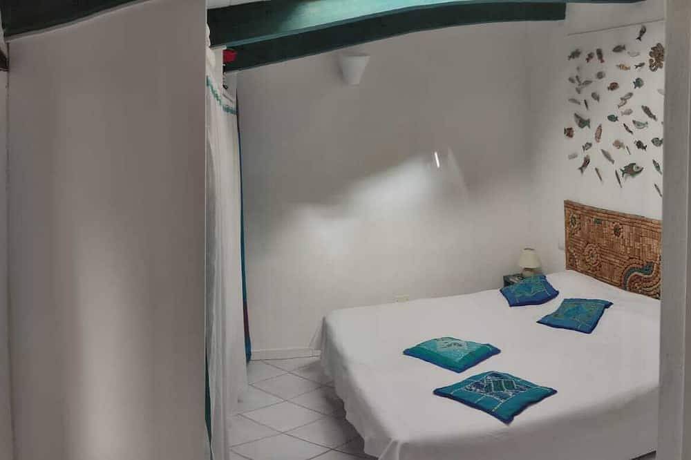 Characteristic little house in the historic center at the foot of the Malaspina castle in Bosa, Planargia