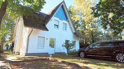 Ferienhaus für 6 Personen, mit Terrasse und Seeblick sowie Garten auf Fischland - Darß - Zingst