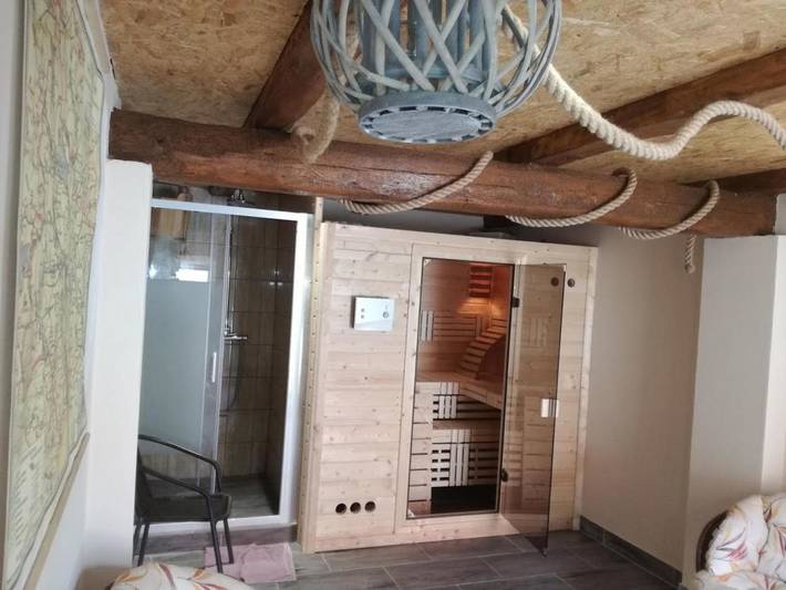 Domek letniskowy dla 7 osób, z Balkon i Jacuzzi oraz Taras i Ogród na Mazury