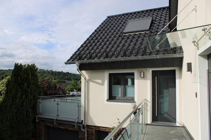 Ferienhaus für 4 Personen, mit Balkon und Terrasse sowie Sauna und Ausblick
