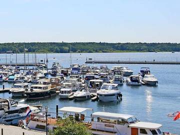 Ferienwohnung für 2 Personen, mit Garten und Seeblick in Waren (Müritz)