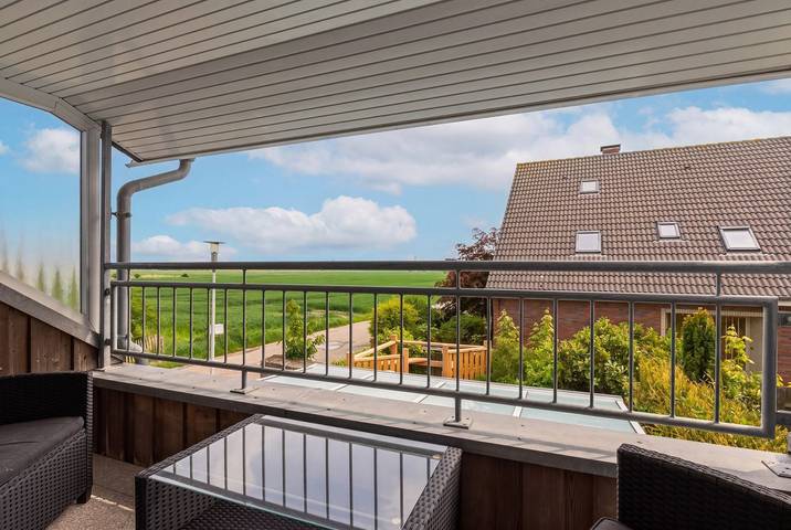 Ferienwohnung für 4 Personen, mit Balkon und Ausblick in Norddeich Mole