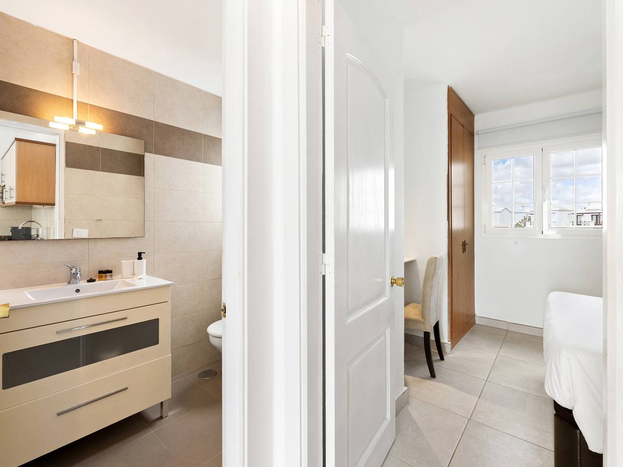 Entire apartment, Arena Apartment in Puerto del Carmen with communal pool in Los Pocillos, Tías