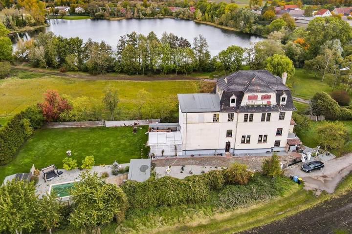 Ferienwohnung für 7 Personen, mit Terrasse und Garten sowie Sauna und Seeblick