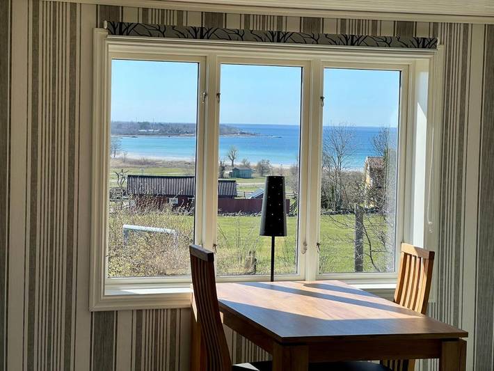 Ferienwohnung für 4 Personen, mit Terrasse und Garten sowie Ausblick und Seeblick in Köpingsvik