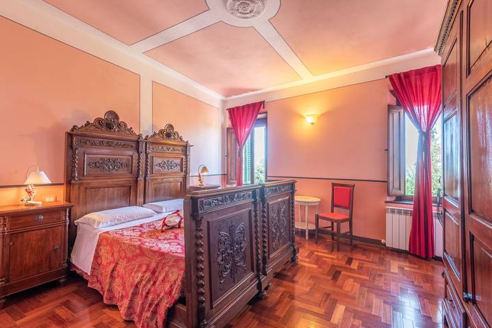 Camera 'Camera Rossa' con terrazza condivisa e Wi-Fi in Montalcino, Val d’Orcia