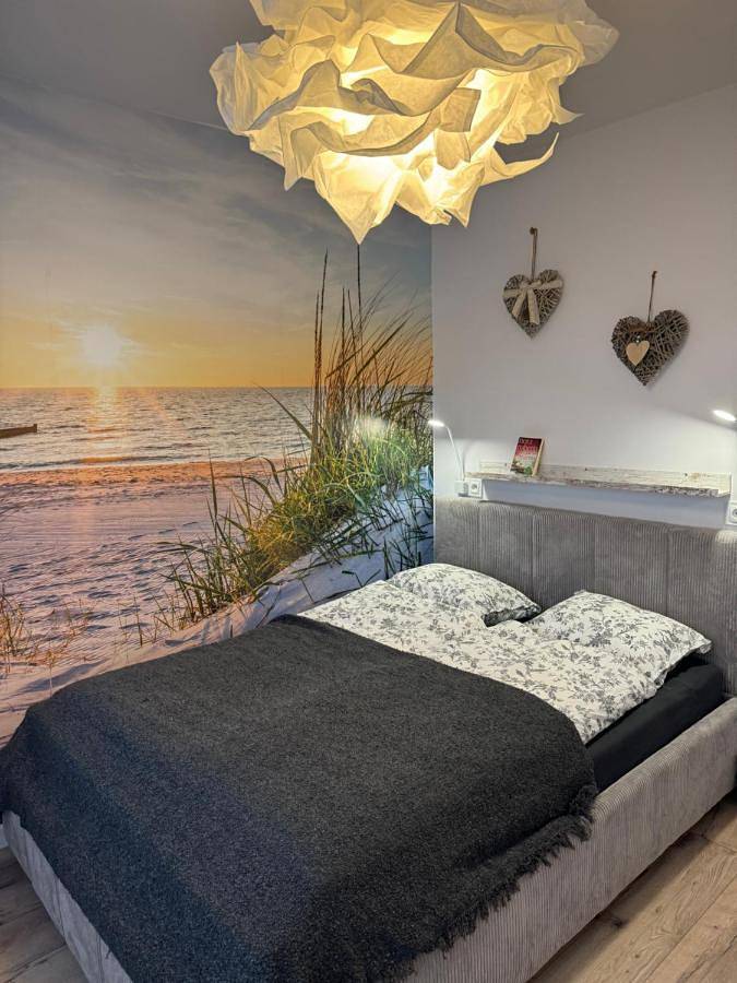 Apartament wakacyjny dla 4 osób, z Balkon i Widok na jezioro oraz Widok w Lębork
