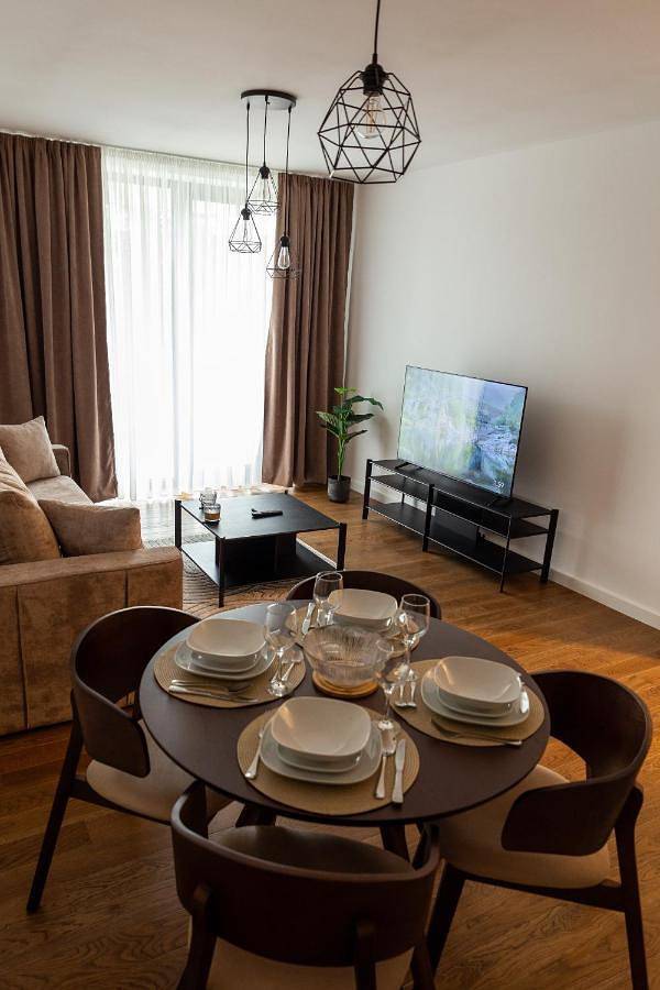 Appartement de vacances pour 4 personnes, avec sauna et jardin ainsi que piscine et vue