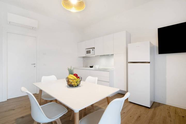 Studio entier, Studio 'Open Space 2' avec jardin partagé, Wi-Fi et climatisation in Lido di Jesolo, Jesolo-City