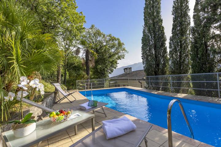Villa per 8 persone, con vista lago e terrazza nonché piscina, con animali domestici in Trentino