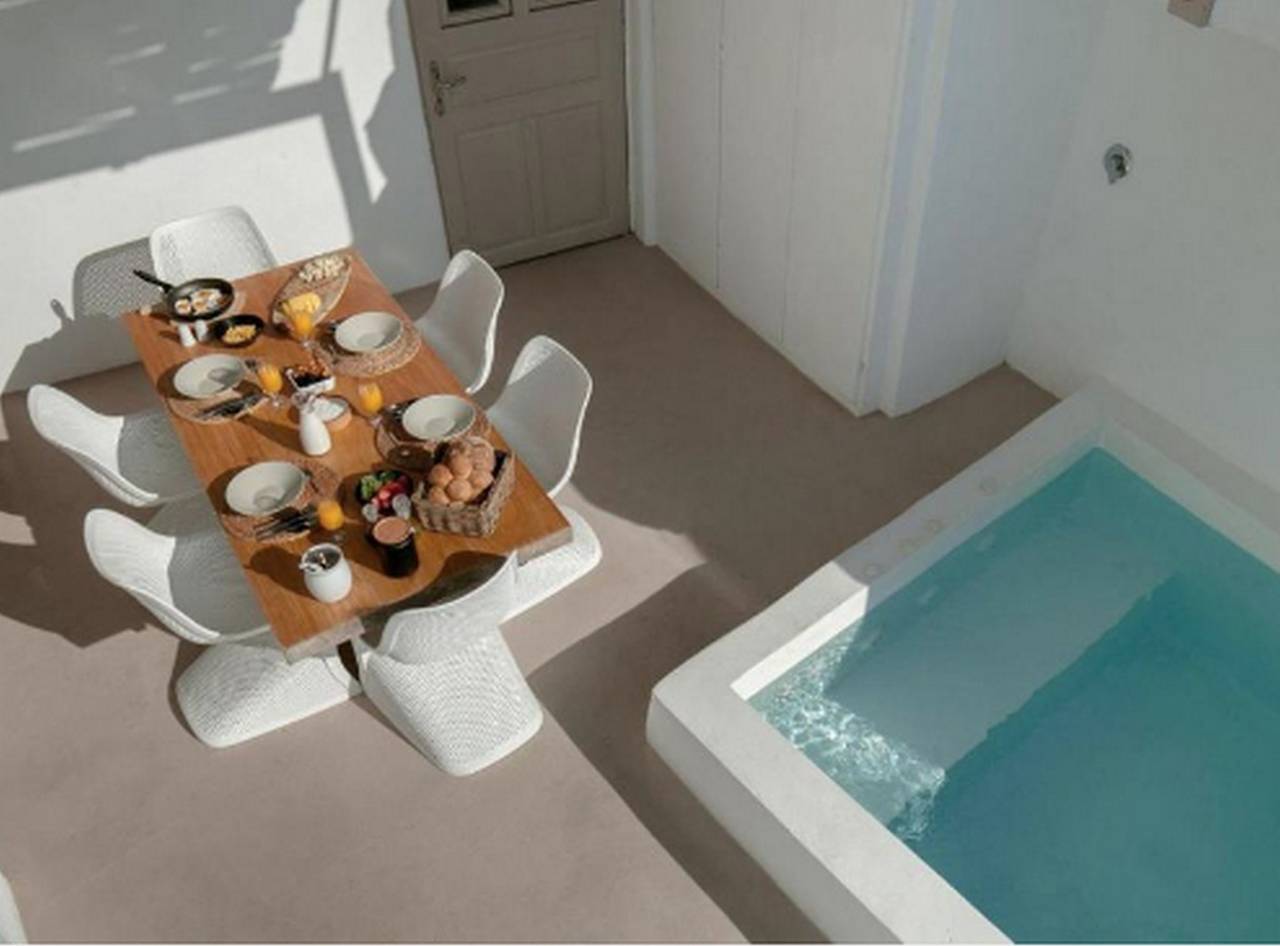 Dazzling Santorini Villa | Villa Aragon | 3 Bedrooms | Children under 12 years old are not allowed | Breathtaking Caldera Viwes | Sun Deck | Outdoor Jacuzzi | Shaded Terrace with Outdoor Dining Area | Indoor Cave Jacuzzi | Agiou Mina, Fira in Firostefani, Thera