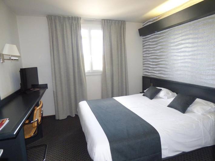 Hôtel pour 4 personnes, avec Jacuzzi et Jardin ainsi que Piscine et Sauna