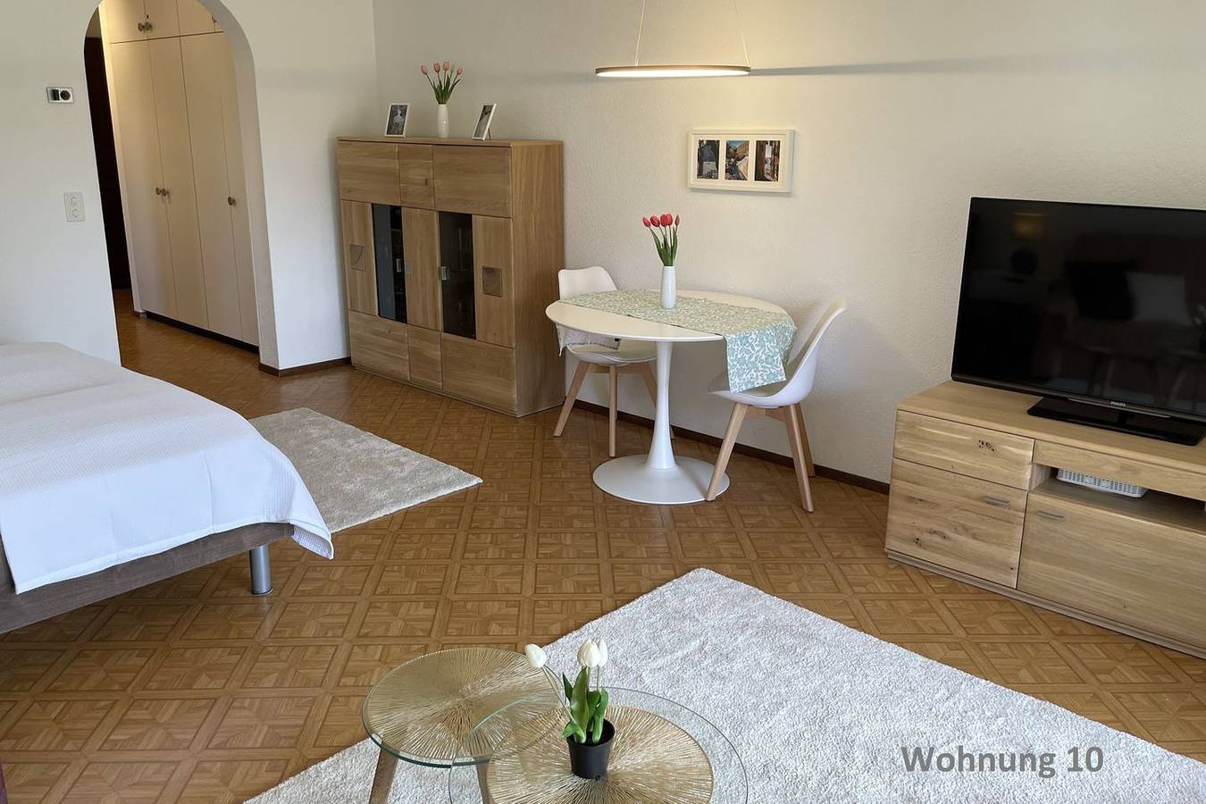 Geheel appartement, Sunny garden apartment with terrace, communal pool, and lawn for sunbathing in Ascona, Ticino Alpen en Verbano