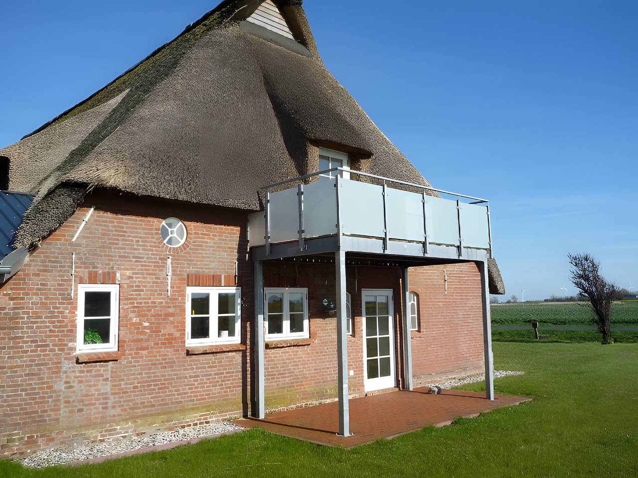 Ganze Wohnung, Ferienwohnung 'Am Halbmond 1' mit Privatterrasse, Gemeinschaftsgarten und Wi-Fi in Hellschen-Heringsand-Unterschaar, Nordseeküste