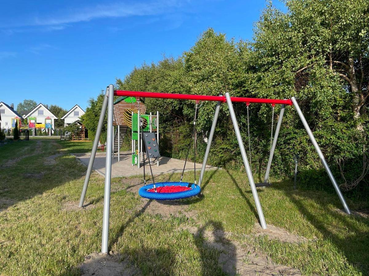 Domki Letniskowe Malinka Dąbki Bobolin in Bobolin, Powiat sławieński