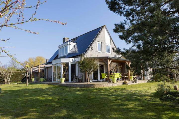 Ferienwohnung für 4 Personen, mit Terrasse und Garten sowie Seeblick und Ausblick in Wervershoof