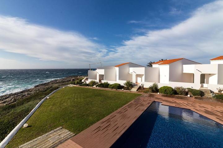 Villa pour 4 personnes, avec piscine ainsi que jardin et vue à Binibeca