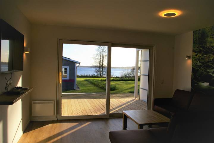 Ferienhaus für 4 Personen, mit Terrasse und Garten sowie Seeblick in Wittensee