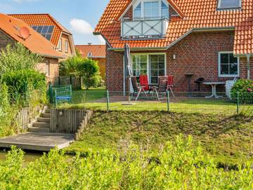 Ferienwohnung für 5 Personen, mit Garten und Terrasse, mit Haustier in Krummhörn