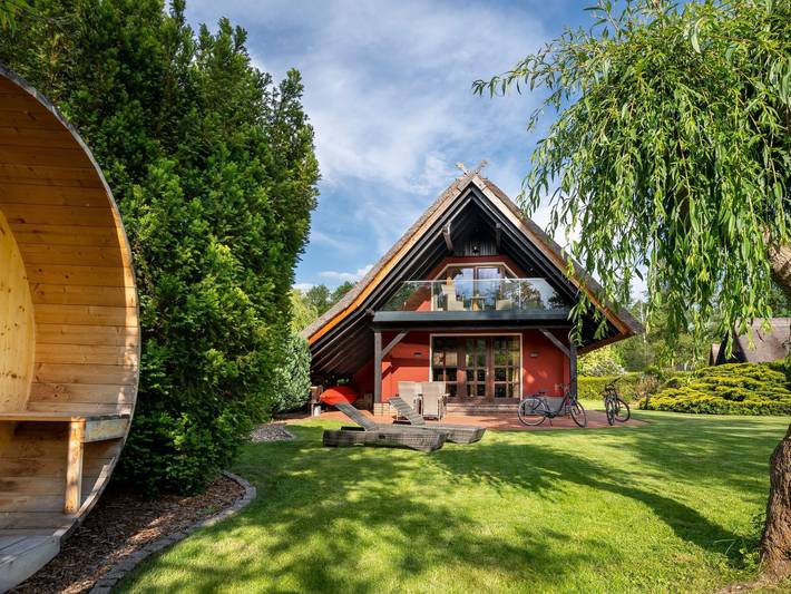 Ferienhaus für 4 Personen, mit Balkon und Terrasse sowie Garten und Sauna