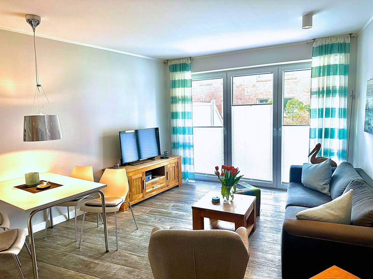Ganze Wohnung, Apartment 'Strandart' mit privater Terrasse, Gemeinschaftsgarten und Wlan in Norddeich Mole, Norddeich