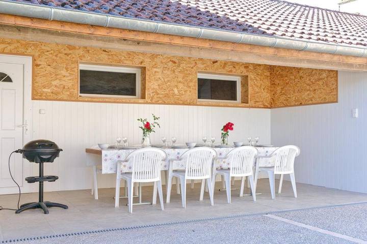 Appartement de vacances pour 8 personnes, avec Terrasse ainsi que Jardin et Vue