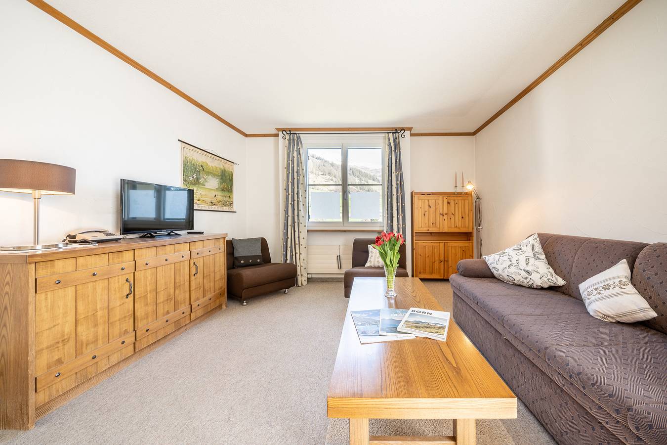 Ganze Wohnung, 7004 Gemütlich eingerichtete Wohnung mit wunderschön bewachsener Terrasse in Vulpera, Tarasp