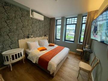 Hôtel pour 3 personnes, avec vue et jardin à Hotton