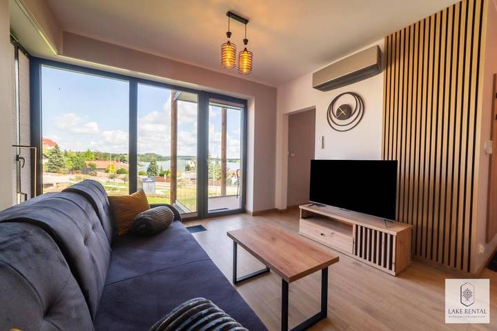 Ferienwohnung für 4 Personen, mit Balkon und Ausblick sowie Seeblick und Sauna in den Masuren
