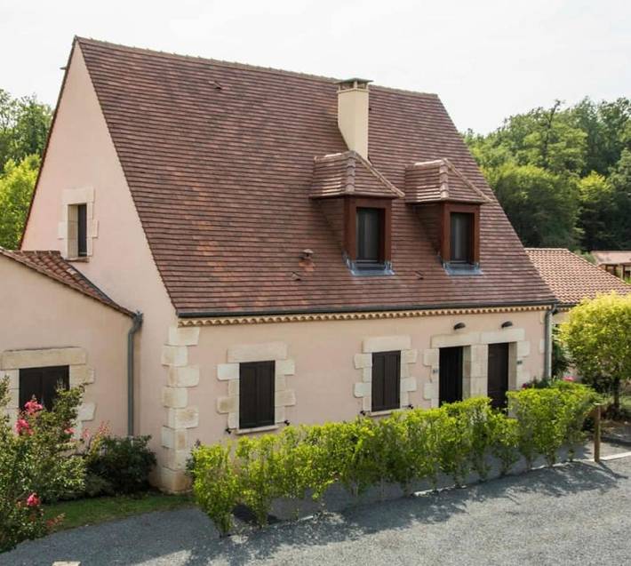 Appartement de vacances pour 2 personnes, avec jardin et vue ainsi que piscine et bassin pour enfant