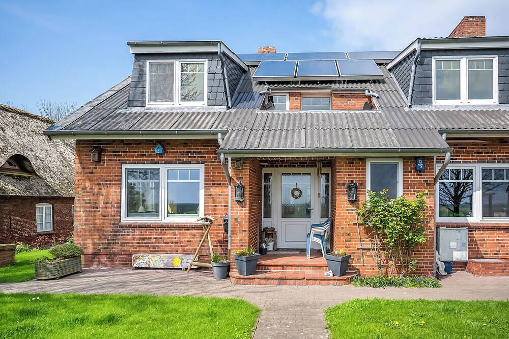 Ganze Wohnung, Ferienwohnung 'Hallighof' mit Meerblick, Gemeinschaftsgarten und Wi-Fi in Langeneß, Halligen