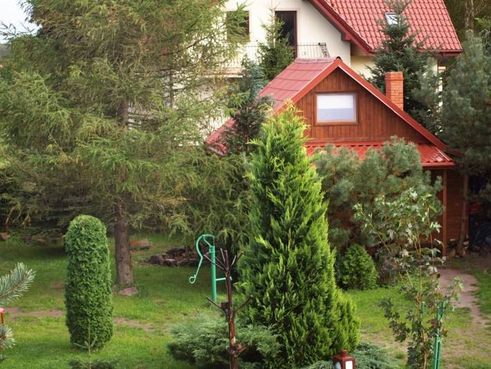 Ferienhaus für 6 Personen, mit Terrasse und Garten sowie Ausblick und Seeblick in Leba