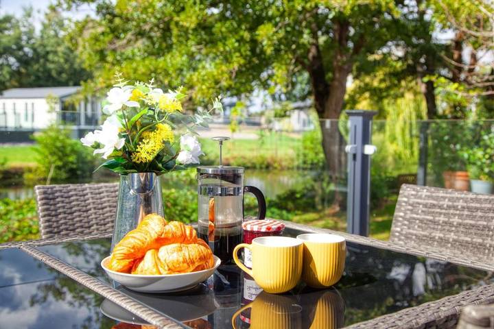 Ferienhaus für 4 Personen, mit Terrasse und Garten sowie Seeblick und Ausblick in New Forest National Park