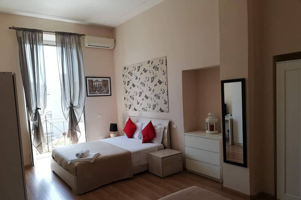 Chambre quadruple avec vue sur la basilique de San Giovanni in Laterano in Rome, Province de Rome
