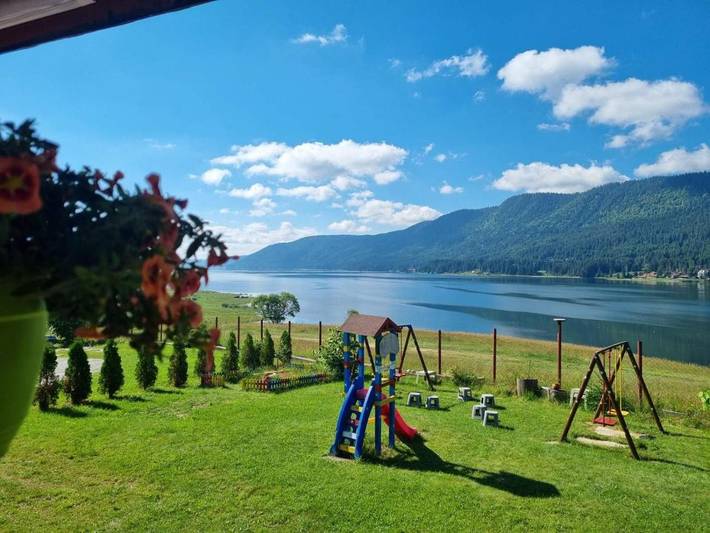 Hôtel pour 3 personnes, avec jardin ainsi que vue et vue sur le lac