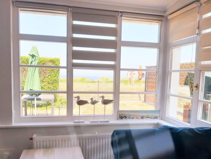 Ferienwohnung für 4 Personen, mit Terrasse und Garten sowie Ausblick in Glowe
